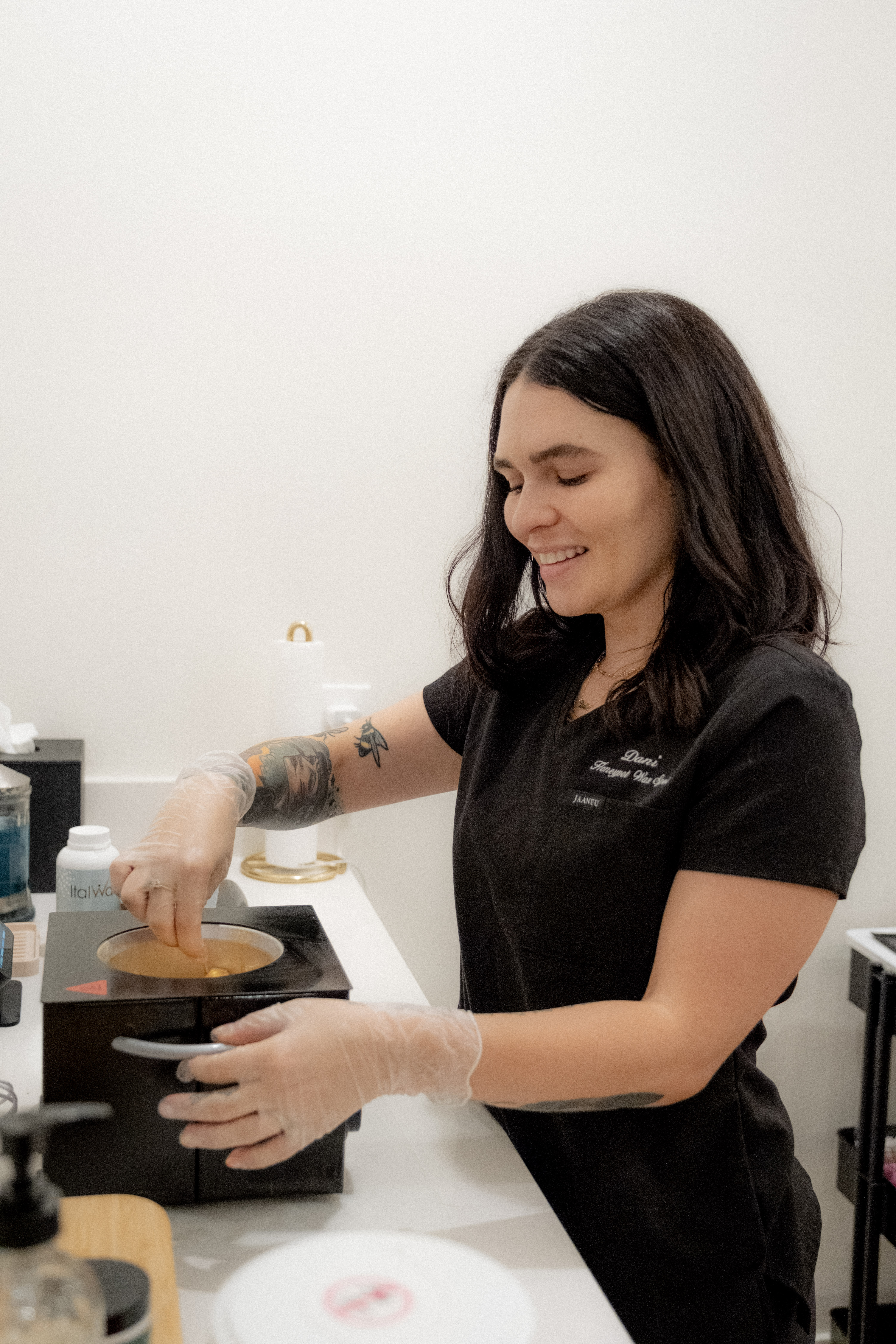 Dani preparing wax at Honeypot Wax Spot